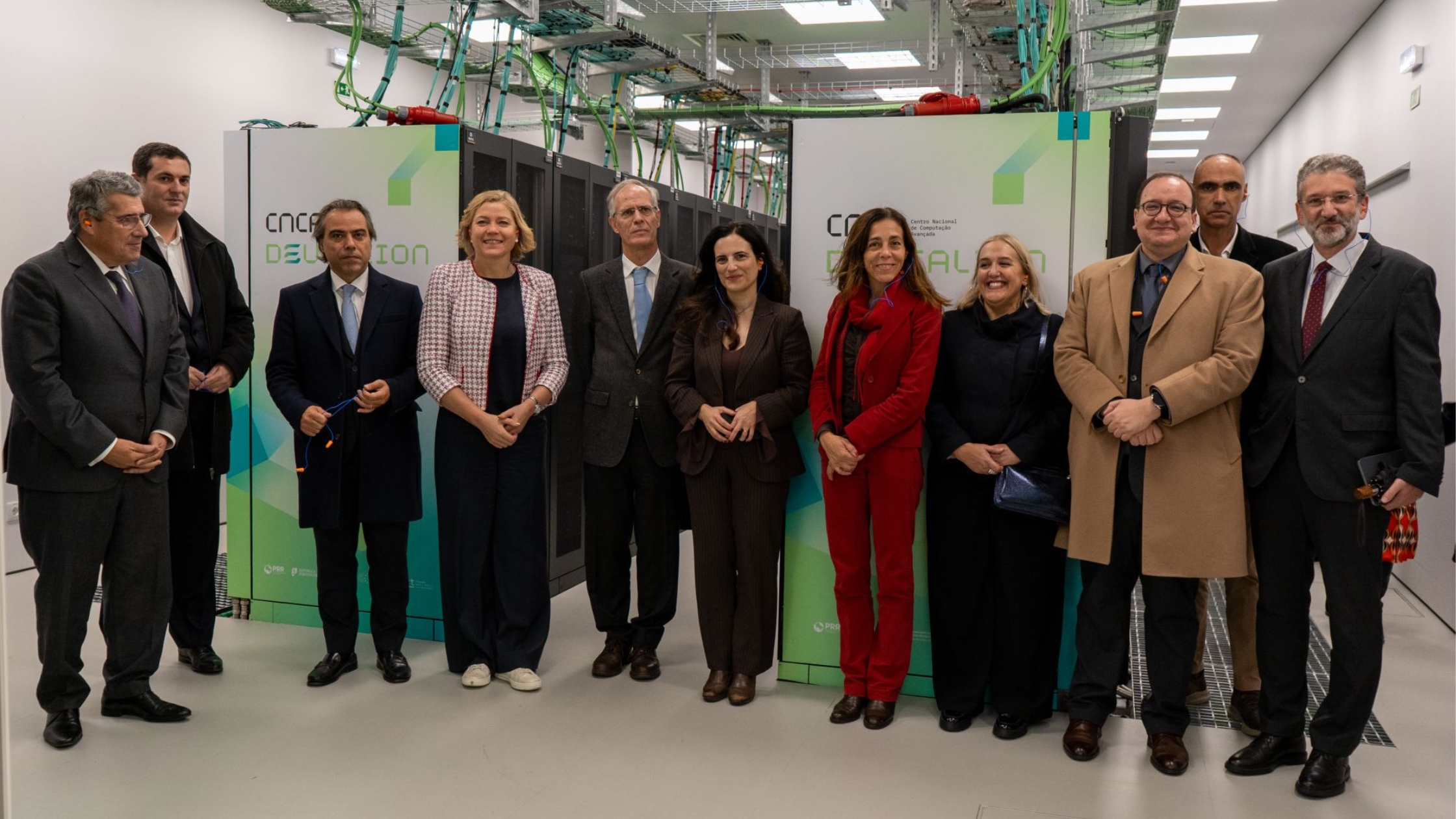 Group photo of European and national representatives at CNCA Deucalion facility, highlighting collaboration in HPC and digital infrastructure.