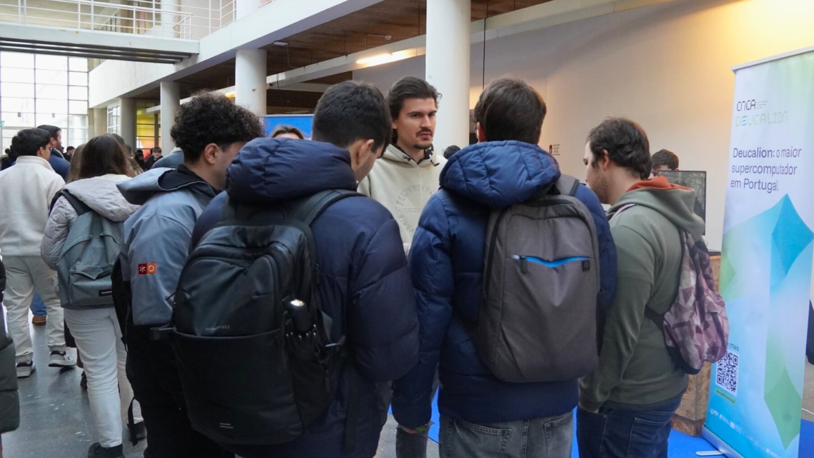 Deucalion team members engaging with prospective master’s students.