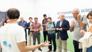 Participants gather during a guided tour of the Deucalion supercomputer facility.